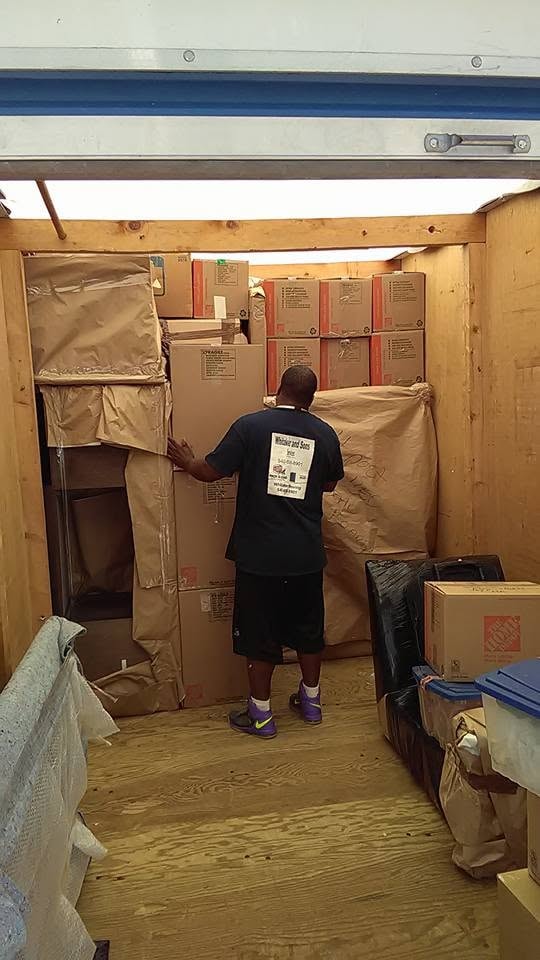 Appliance wrapped in plastic for moving